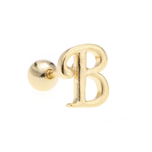 Macro shot of 18K gold letter B stud earring featuring a secure screw ball back closure