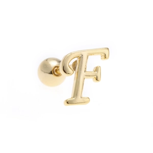 Macro detail of 18K gold letter F stud earring with minimalist polished finish and screw ball