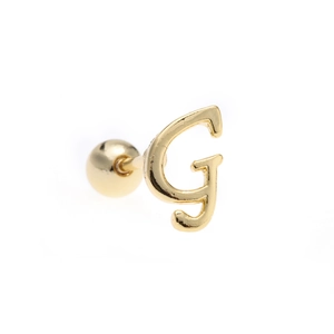 Detailed macro view of 18K gold letter G stud earring with secure screw-on ball back