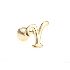 Macro shot of 18K gold letter V cartilage earring with threaded ball back screw