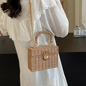 Retro handmade woven straw bag with gold chain strap for women, elegant crossbody purse