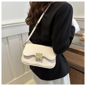 Elegant white chain square bag with golden bear buckle and glossy leather finish