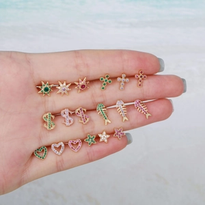 Detailed collection of mini gold-plated earrings with colorful zircon in various shapes