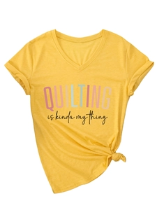 Detail of V-neck yellow cotton T-shirt with QUILTING print and stylish front knot