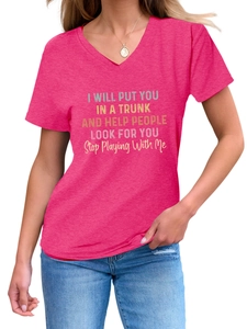 Detail of V-neck fuchsia t-shirt with funny quote print on soft fabric surface