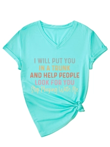 Detail of turquoise V-neck T-shirt with humor print and stylish front hem knot
