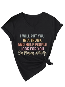 Detail of V-neck black T-shirt featuring colorful slogan print and bottom knot detail