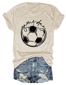 Close-up of a game day football graphic t-shirt paired with distressed denim shorts