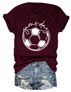 Close-up of maroon Game Day T-shirt with football print paired with denim shorts