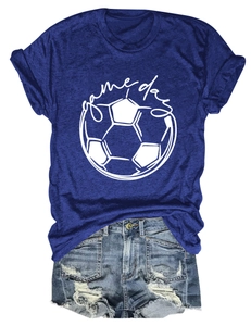 Flat lay of blue Game Day soccer T-shirt paired with distressed denim shorts