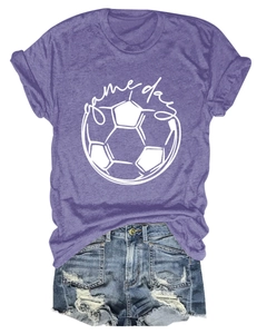 Detailed flat-lay of purple Game Day football t-shirt with distressed denim shorts