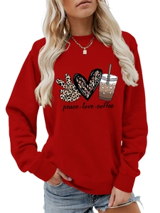 Detail of red long sleeve sweatshirt featuring creative peace love coffee graphic print
