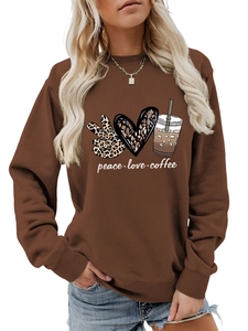 Detail of peace love coffee sweatshirt with leopard print gesture and ribbed cuffs