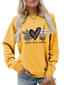 Detail of peace love coffee graphic print on yellow crewneck long sleeve sweatshirt