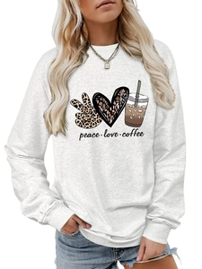 Detail of peace love coffee graphic print on a heather grey long sleeve sweatshirt