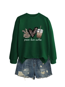 Detail of peace love coffee graphic print on dark green long sleeve crewneck sweatshirt