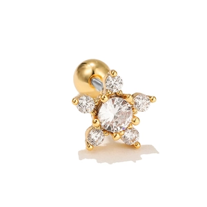 Macro shot of gold star helix stud with clear zircon stones and ball screw back closure