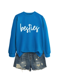 Blue crewneck sweatshirt with Besties print paired with frayed denim shorts