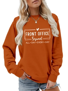 Detail view of ribbed crew neck and Front Office Squad letter print on orange sweatshirt