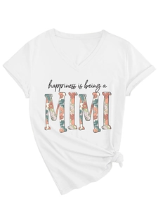 Detail of white V-neck T-shirt featuring floral Mimi print and side knot design