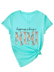 Detail of mint green V-neck T-shirt with MIMI floral text and stylish side knot design