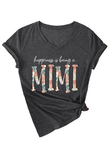 Detail of V-neck dark grey T-shirt with MIMI floral print and stylish front knot hem