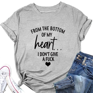 Flat lay of gray cotton t-shirt with heart slogan paired with blue denim jeans