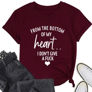 Close-up of burgundy cotton T-shirt with heart slogan print and knot hem detail