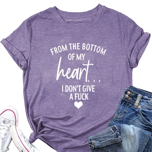 Close-up of a purple cotton t-shirt featuring bold white typography and heart graphics