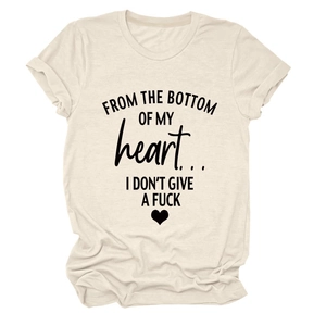 Detail of cotton t-shirt fabric with heart graphic and artistic letter printing