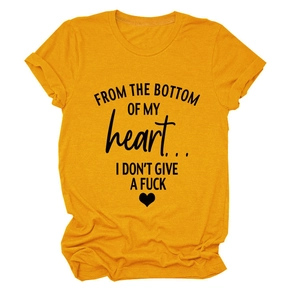 Detail of black graphic lettering and heart print on a yellow cotton short sleeve T-shirt