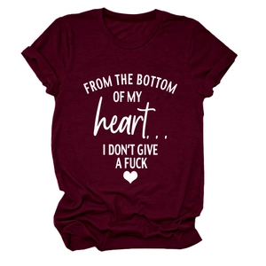 Detail of burgundy cotton T-shirt featuring white slogan and heart graphic print