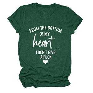 Close-up of green cotton T-shirt featuring white slogan and heart graphic detail