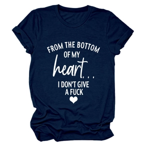 Close-up of navy blue T-shirt featuring white artistic slogan text and heart print