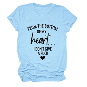 Close-up of light blue cotton T-shirt featuring heart print and rolled sleeve details