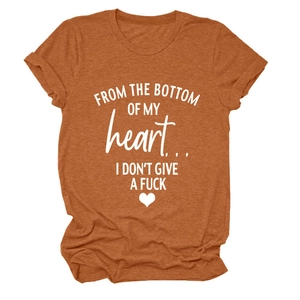 Detail of caramel cotton T-shirt with white graphic slogan and rolled cuff sleeves
