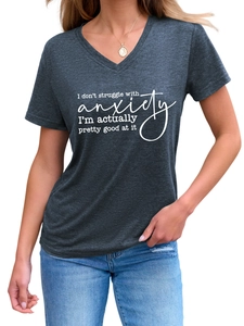 Detail of V-neck dark grey t-shirt featuring a white humorous anxiety quote print