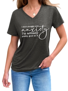 Detail of V-neck dark grey t-shirt with 'I don't struggle with anxiety' slogan print