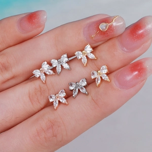 Elegant butterfly stud earrings with marquise zirconia crystals in gold, silver, and rose gold