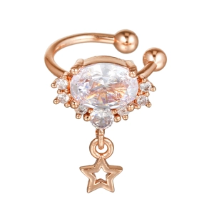 Detail of rose gold ear cuff with oval zircon center and hanging hollow star pendant
