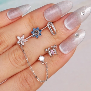 20G stainless steel helix studs set with butterfly and sunflower zircon motifs