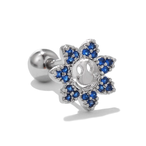 Detail of sunflower ear stud with blue zircon petals and smiling face center design
