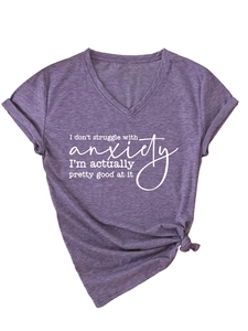 Detail of purple V-neck T-shirt showing rolled sleeves and side knot detail