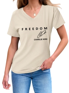 Detail of V-neck cream T-shirt with Freedom Charlie Kirk print and signature on soft fabric