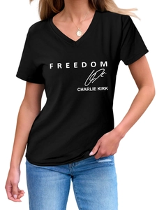 Close-up of black V-neck t-shirt featuring white Freedom Charlie Kirk print and soft fabric