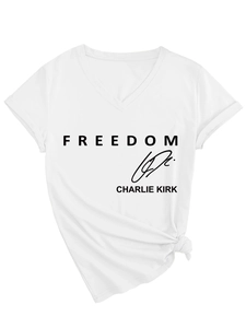 Detail of white V-neck cotton T-shirt featuring Freedom Charlie Kirk text and front hem knot