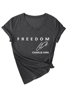 Detail of V-neck charcoal t-shirt featuring freedom print and Charlie Kirk signature