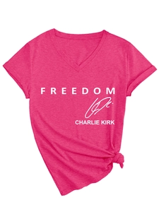 Detail of rose red V-neck T-shirt with Freedom Charlie Kirk print and knot hem