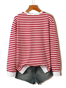 Detail of red and white striped long-sleeve sweatshirt with white ribbed neckline