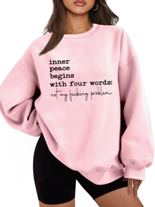 Pink oversized hoodie with inner peace begins with four words slogan and ribbed cuffs